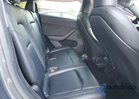 2023 Tesla Model Y from USA, damaged, VIN 7SAYGDEE2PA210900